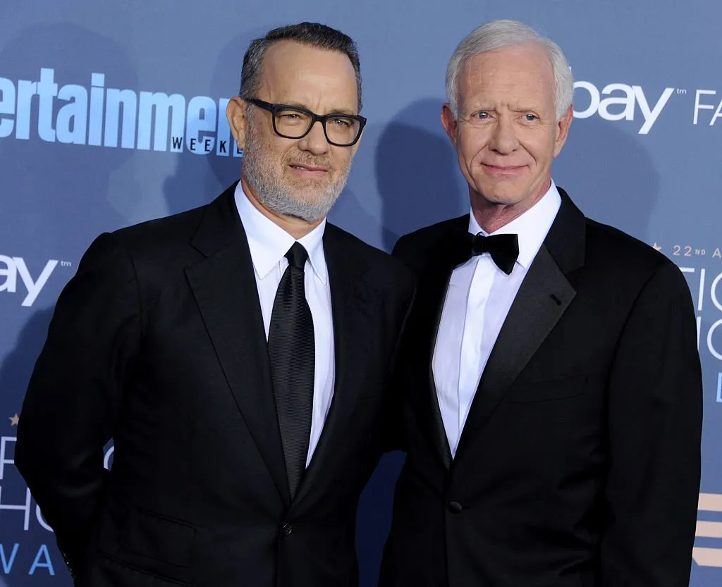 chesley sully- ullenberger and actor tom hanks arrive at news photo and we will discuss Why did Sully lose his pension.