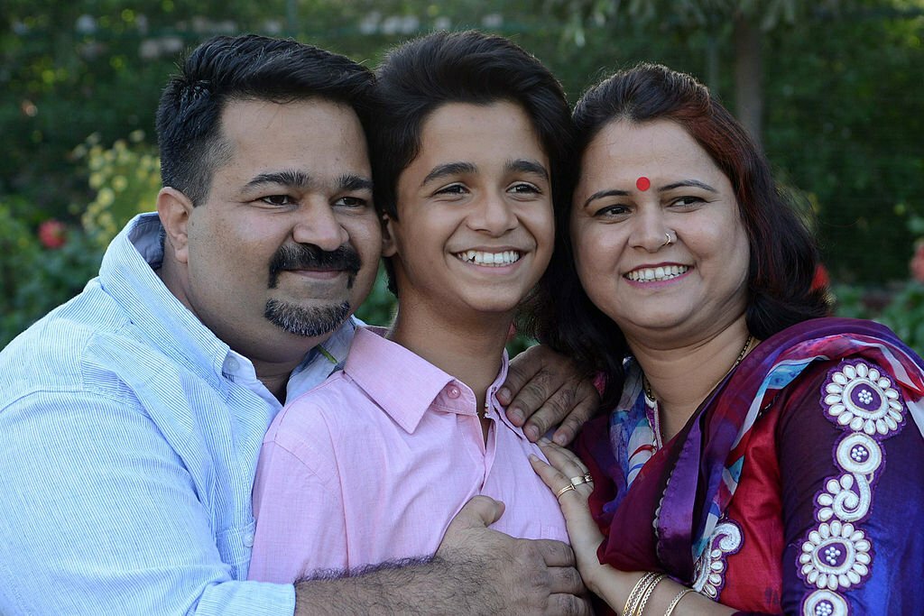 Ritvik Sahore with his father and mother