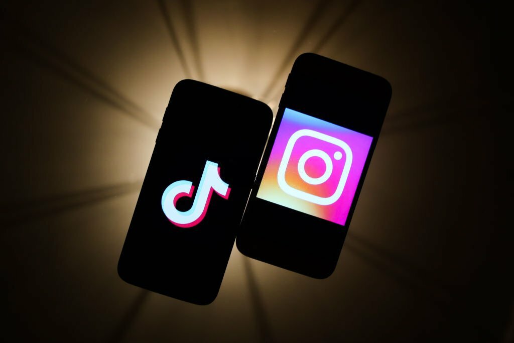 Instagram and tik tok logos on a mobile